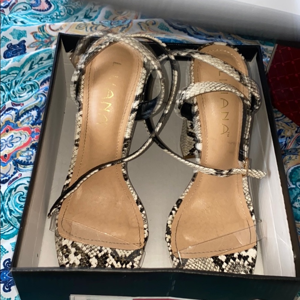 Liliana snake skin clear band heels